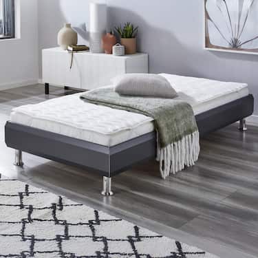 Surmatelas en mousse confort Sleezzz® Basic de 2,5 cm 100 x 200 cm avec piquage ondulé 7 zones et élastiques d'angle